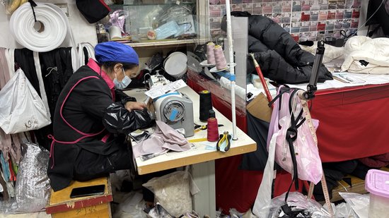 羽绒服翻新业务走红！有门店订单压到20天后-1.jpg